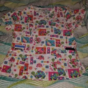 Cute, friendly turtle scrub top.